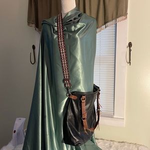 Like new The Sak leather crossbody purse.